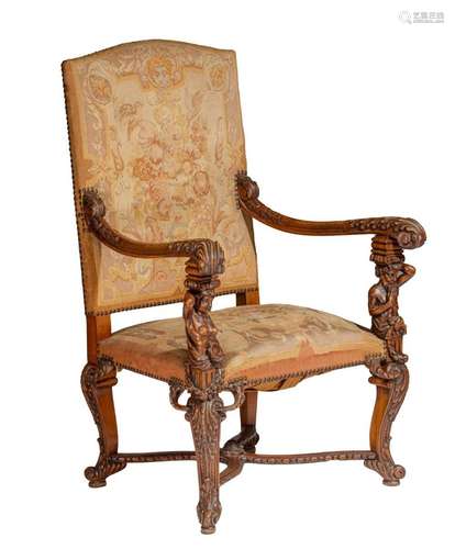 A very fine Renaissance Revival carved walnut armchair, with...