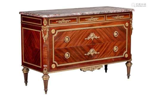 A Louis XVI style mahogany veneered commode with gilt brass ...