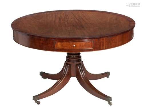 An English Regency mahogany and rosewood veneered drum table...