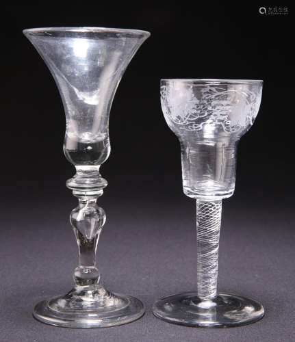 AN 18TH CENTURY SODA GLASS WINE AND AN ENGRAVED AIR TWIST WI...