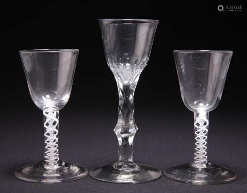 TWO 18TH CENTURY OPAQUE TWIST SMALL WINE GLASSES AND A FACET...