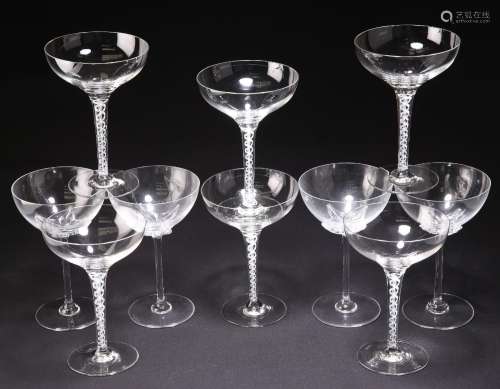 A GROUP OF CHAMPAGNE GLASSES