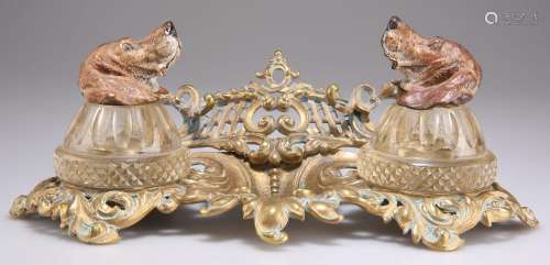 A LATE VICTORIAN BRASS AND COLD-PAINTED INKSTAND