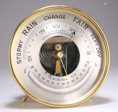 AN EARLY 20TH CENTURY BRASS DESK-TOP BAROMETER