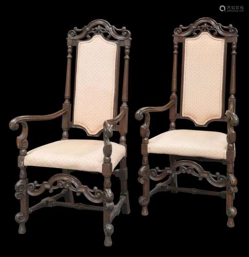 A PAIR OF WILLIAM AND MARY STYLE STAINED BEECH HIGH-BACK ARM...