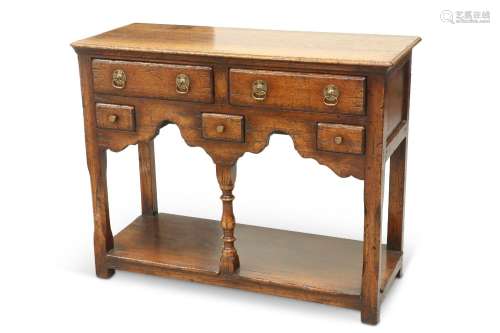 A TITCHMARSH & GOODWIN SMALL OAK DRESSER BASE, IN PERIOD...