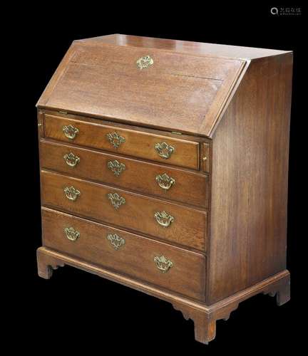 A GEORGE III OAK SLANT-FRONT BUREAU