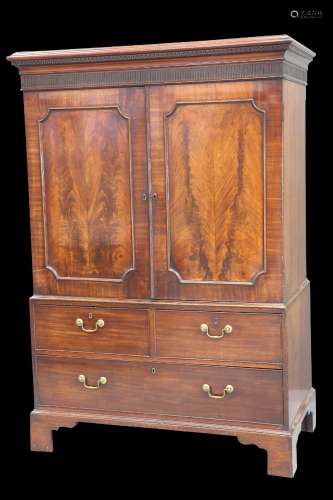 A GEORGE III MAHOGANY GENTLEMAN'S PRESS CUPBOARD