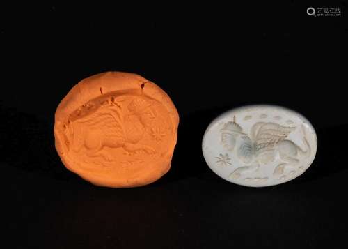 A GREEK AGATE INTAGLIO OF A SPHINX