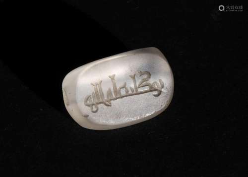 AN ISLAMIC ROCK CRYSTAL SEAL INSCRIBED WITH KUFIC SCRIPT CIR...