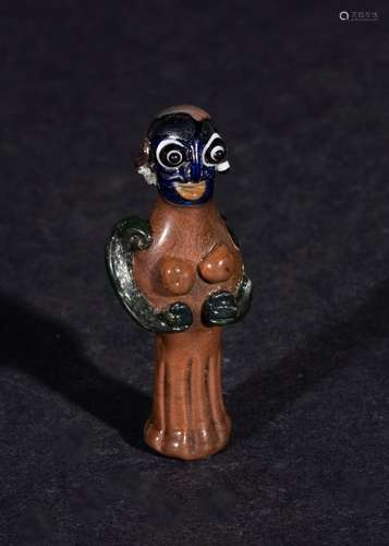 AN EGYPTIAN PHOENICIAN SANDSTONE & GLASS FIGURE