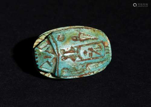 AN EGYPTIAN FAIENCE SCARAB AMULET MIDDLE KINGDOM/LATE PERIOD...