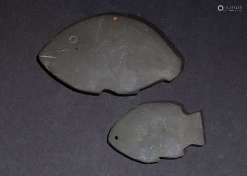 TWO EGYPTIAN OR LATER STONE FISH-SHAPED PALETTE AMULETS
