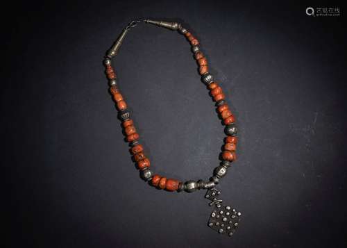 A CORAL & SILVER TRIBAL NECKLACE