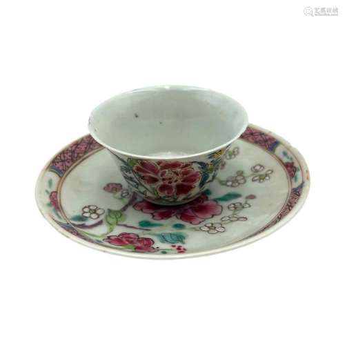 A Chinese famille rose floral decorated teacup and saucer, Y...