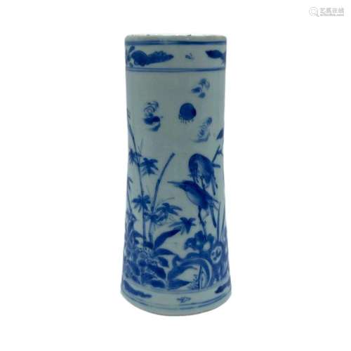 A Chinese blue and white cup, finely decorated with birds in...