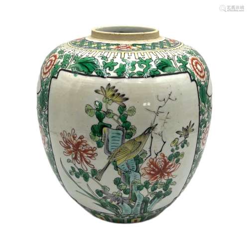 A Chinese famille verte floral decorated jar, the panels wit...