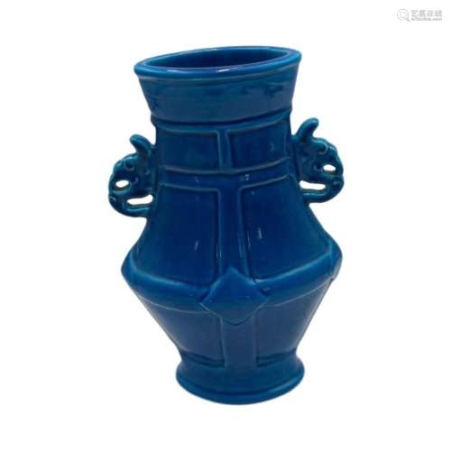 A monochrome blue glazed flat Hu vase, paired with stylised ...