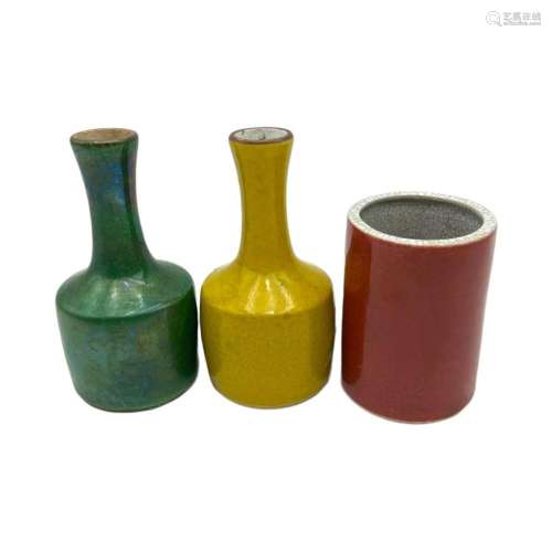 Three Chinese monochrome glazed mallet-shaped vases and a br...