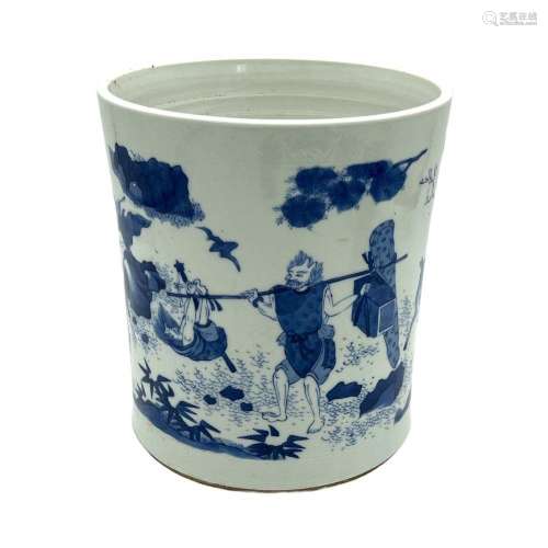 A Chinese blue and white brushpot, decorated with figures in...