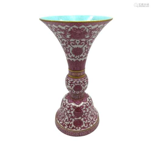 A Chinese altar Gu vase, decorated with scrolling lotus in r...