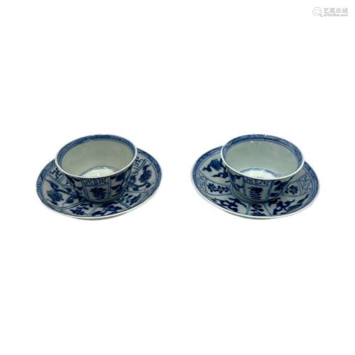 Two sets of Chinese blue and white floral decorated teacups ...