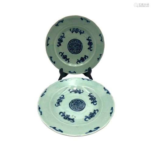 Two celadon-glazed dishes, underglaze blue decorated with a ...