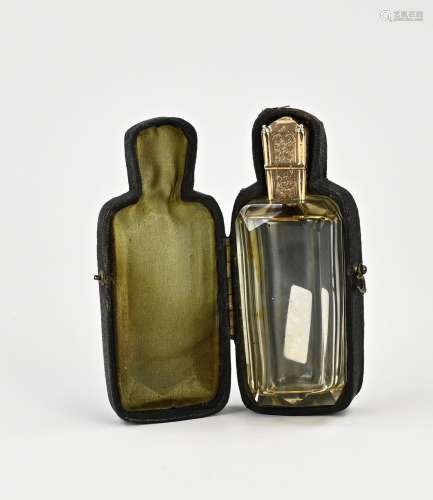 Odeur bottle with gold cap