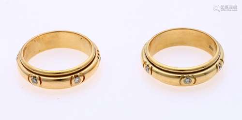 Set of gold rings with diamonds