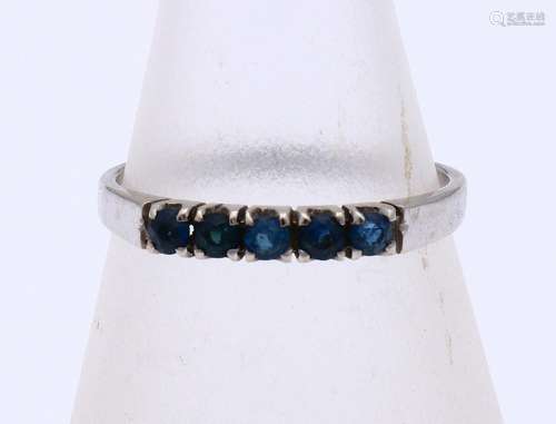 White gold ring with sapphire