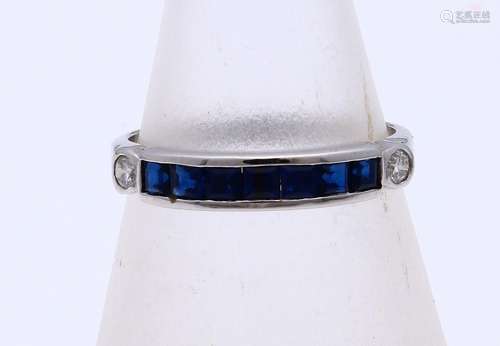 White gold ring with sapphire and diamond