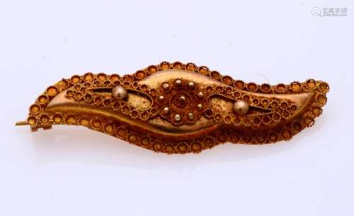 gold brooch