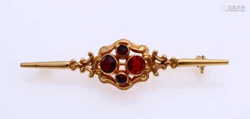 Gold brooch with garnet