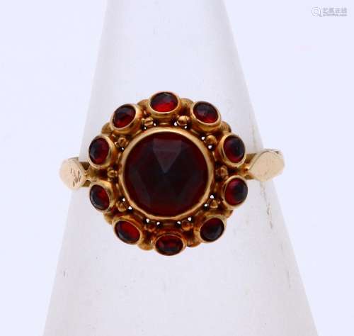 Gold ring with garnet