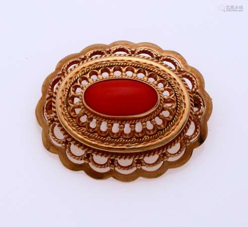 Gold brooch with red coral