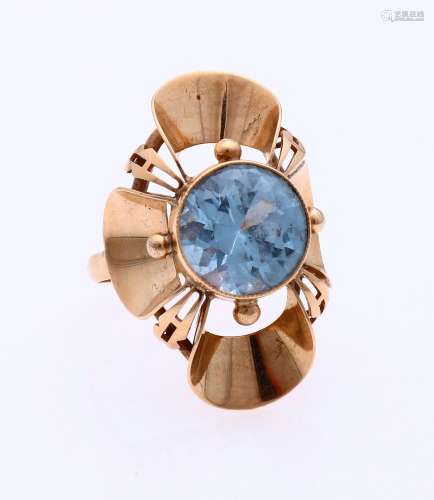 Gold ring with blue stone