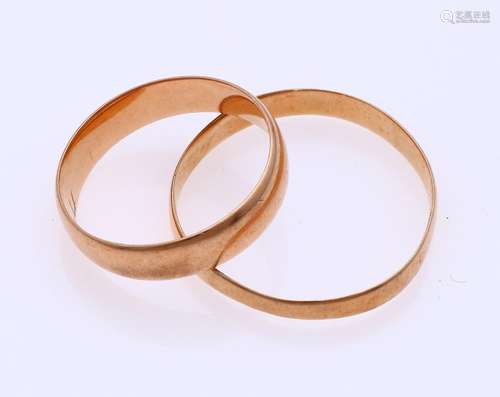 Two gold wedding rings