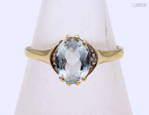 Gold ring blue topaz and diamond