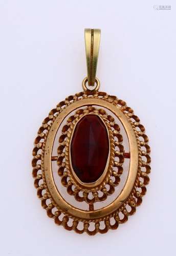 Gold pendant with garnet