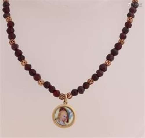 Garnet necklace with portrait pendant