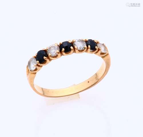 Gold ring with sapphire