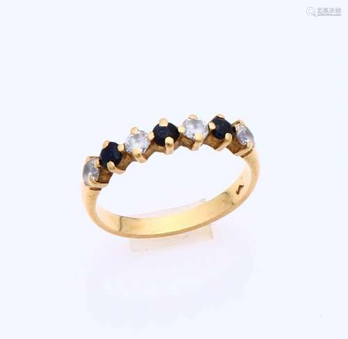 Gold ring with sapphire