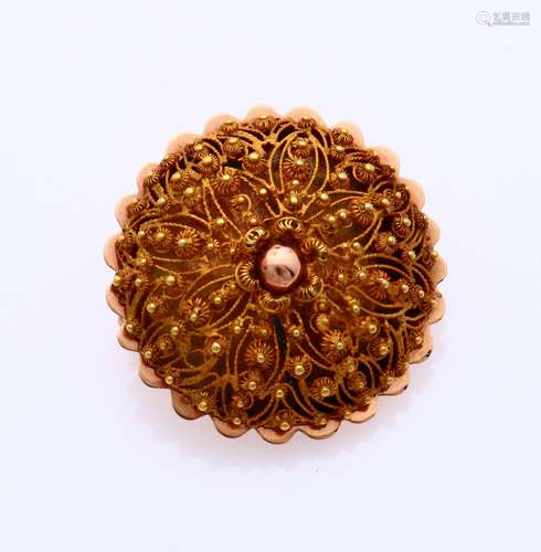 Gold regional brooch