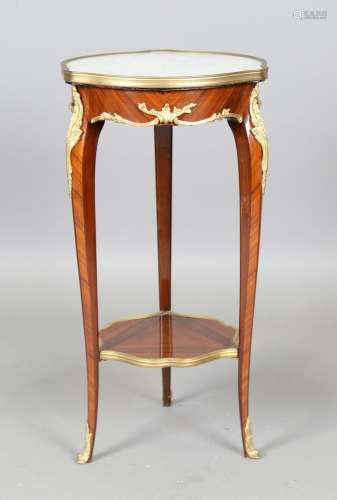 A 20th century French kingwood and ormolu mounted table with...