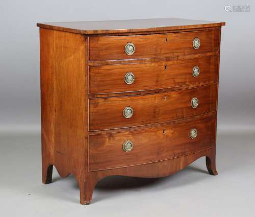 A late George III mahogany bowfront chest of four oak-lined ...