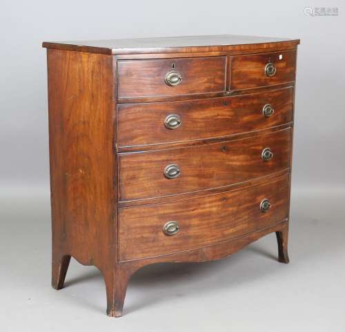 A Regency mahogany bowfront chest of drawers, on splayed leg...