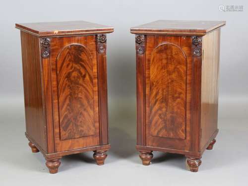 A pair of Victorian mahogany pedestal cabinets, each fitted ...