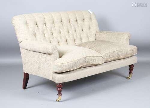 A modern Moinat two-seat settee, upholstered in buttoned tau...