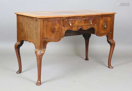 An early 20th century Queen Anne style walnut side table wit...