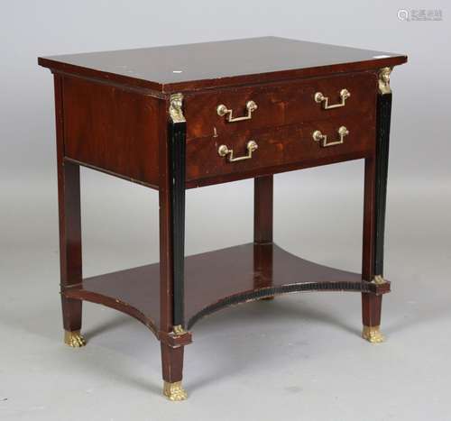 A late 20th century Empire style mahogany side table, fitted...